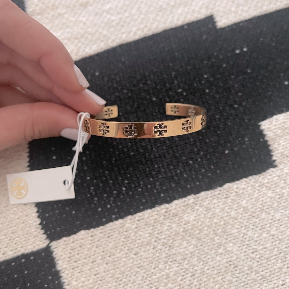 Tory Burch gold “pierced t” cuff bracelet